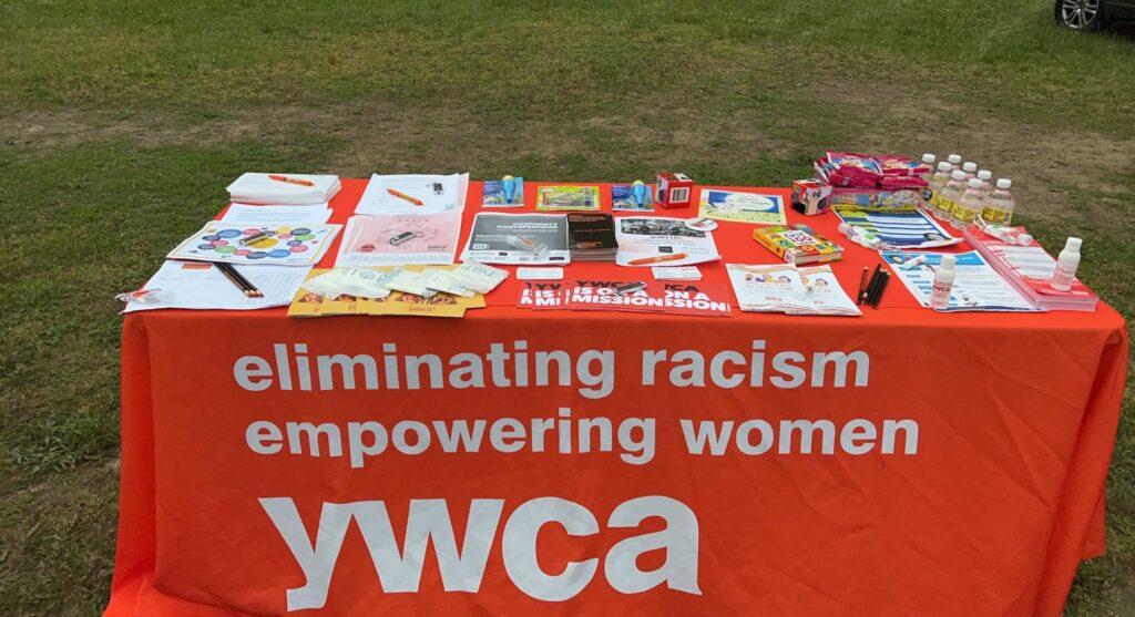 A table showing YWCA Outreach Materials